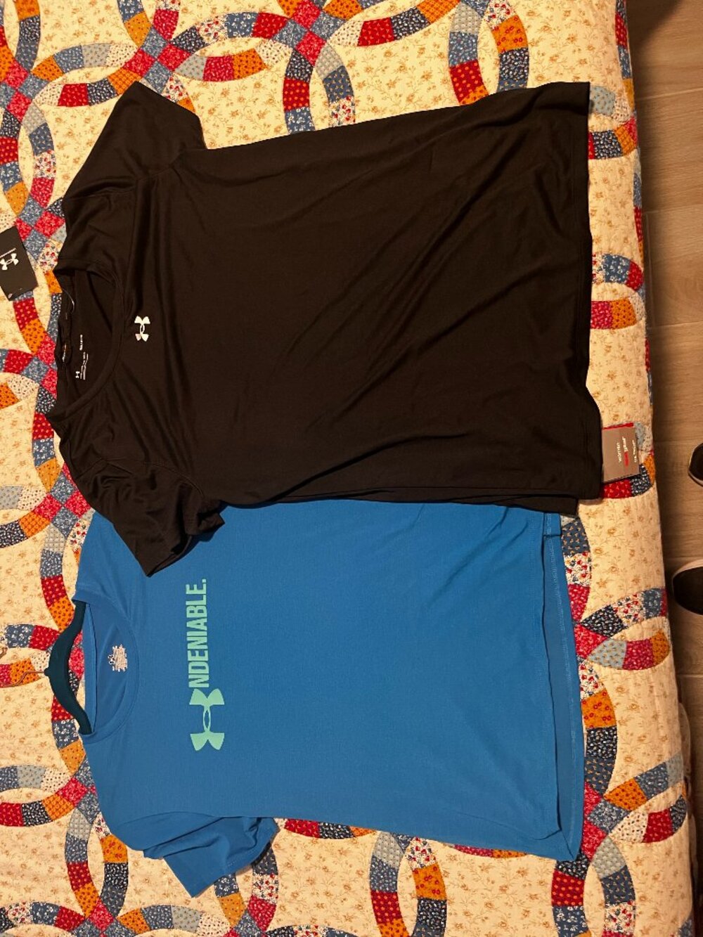 TWO Under Armour lightweight T's size medium Women's